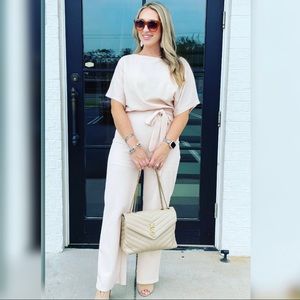 Blush/ Cream colored jumpsuit with tie belt